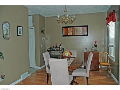Formal Dinning Room with Newer Laminated Flooring