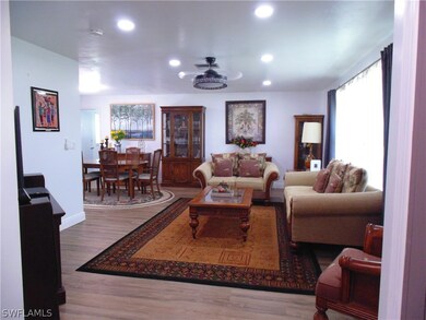 Living room featuring wood-style floors