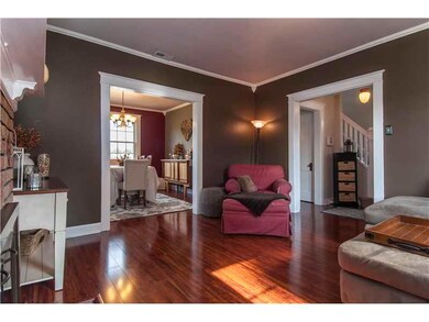 Living Room. LIVING ROOMS OPEN TO THE ENTRY AS WEL