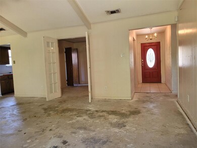 View from back door in living room toward entry fo