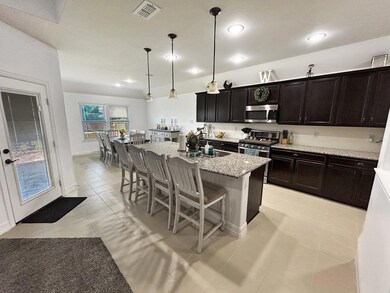 Chef's Kitchen featuring Pendant light fixtures, a