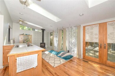 Lots of light in sunroom off of kitchen opens to d