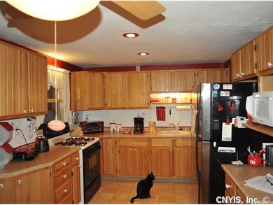 Kitchen Solid Hickory Cabinets, New Floor, New gas
