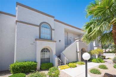 View of exterior entry featuring stucco siding