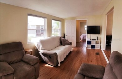 Looking from front door towards 2nd bedroom and la