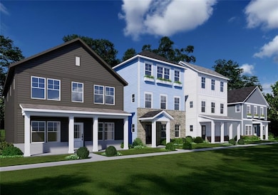 View of front of home featuring a front lawn and a porch