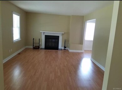 Living Room with Wood burning Fireplace