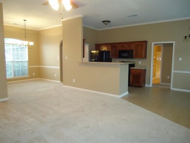 Another view of the greatroom showing the open space to the Dining Rm & Breakfast bar