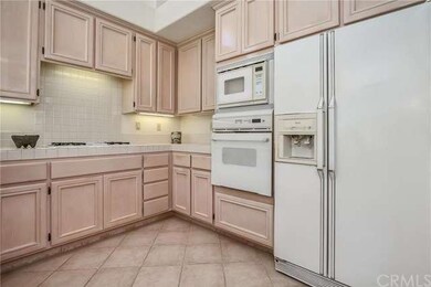 Kitchen is bright and cheery.