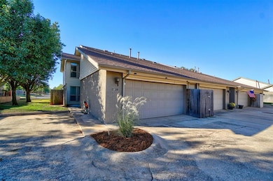 Ranch-style home with a garage