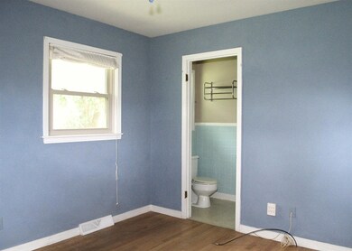 Bedroom 1 with half bath