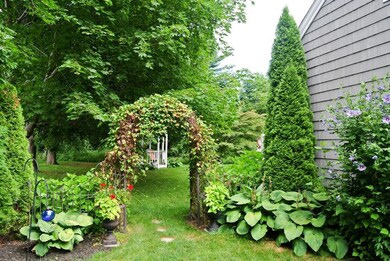 Entrance to yard from left side of home