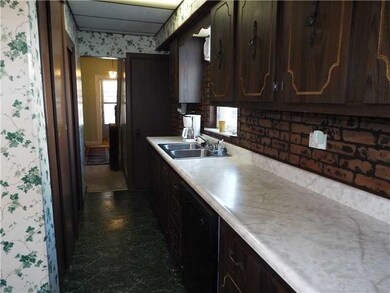 Kitchen. Another view of kitchen featuring prep sp
