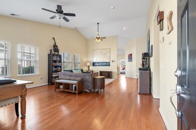 Living room featuring high vaulted ceiling, ceilin