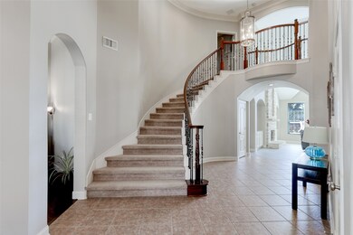 Imagine walking into your home with this amazing entry way with high ceilings and beautiful staircase.