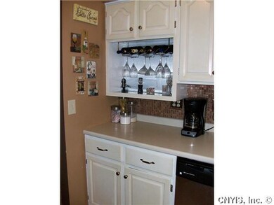 Kitchen. Here are the wine glasses.