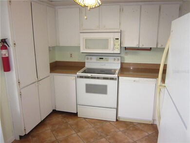 TILED KITCHEN WITH PLENTY OF CABINET SPACE