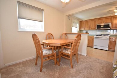DINING ROOM LEADING INTO THE KITCHEN!
