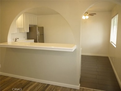 View of the large open concept kitchen from the front door.