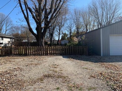 The yard is fenced and cross fenced for privacy, p