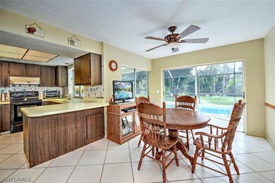 Light and bright kitchen with breakfast bar and a