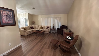 Living room featuring hardwood / wood-style floors