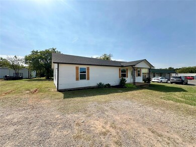 View of front of house featuring a front yard