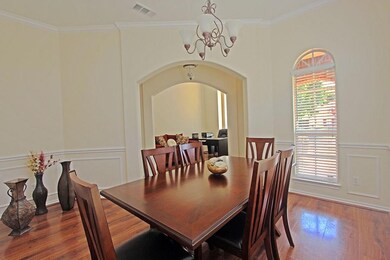 Dining Room with Laminate Flooring, decorative lig