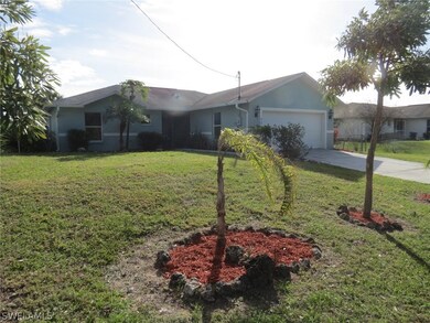 909 Medford Ave S, Lehigh Acres, FL 33974 - photo 2