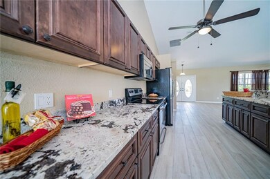 Remodeled Kitchen - Wood Cabinets and Granite