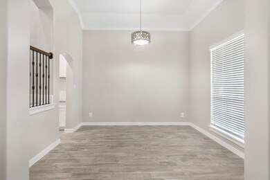 Formal dining room has same beautiful wood floors throughout the home. This home offer so much, EVERYTHING is NEW!