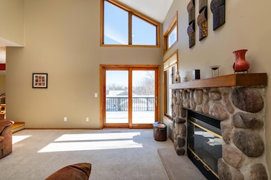 Main floor living room also provides for deck access.
