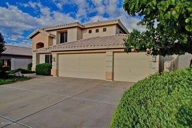 Three-Car Garage with Large Driveway