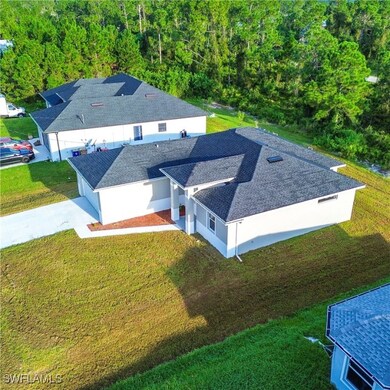 1149 Darling St E, Lehigh Acres, FL 33974 - photo 2