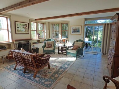 Living room with access to patio and...