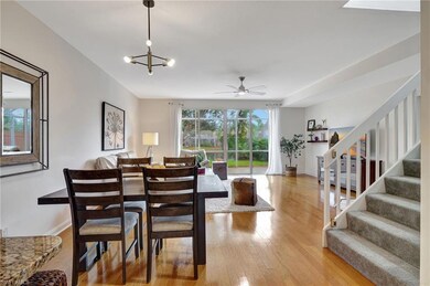 Dining room featuring ceiling fan with notable cha