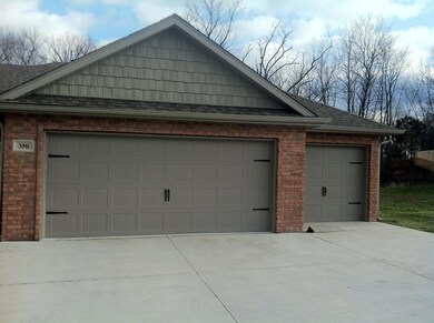garage and shake siding