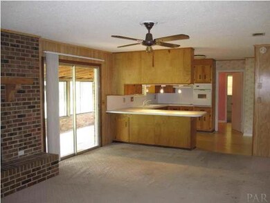 Den and view of kitchen