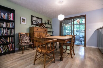 Dining area with sliders to screened porch