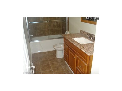 New tiled Bathroom and Granite Vanity
