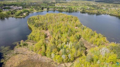 Property setting perfectly capturing the tranquility of the Northwoods from above.