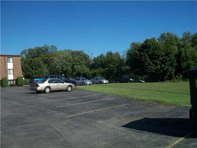 Exterior Front Parking and green area to enjoy!