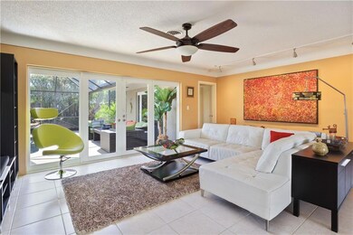 Open floor plan reveals the pool and backyard with lots of light.
