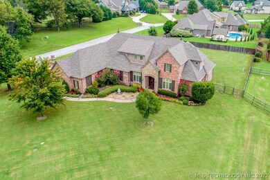 A stunning aerial view of the home and the corner