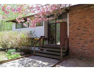 Exterior Front. Front entry to original house