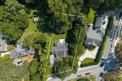 .4266 acres with 108' frontage on Mount Paran. Flat lot.