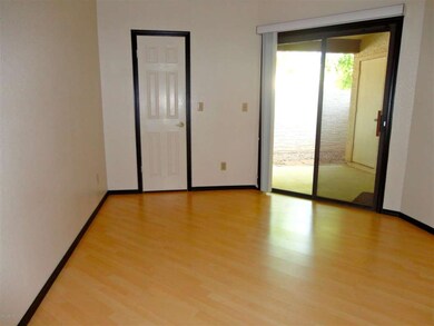 Downstairs Master with Door to Patio