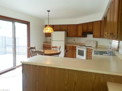 Expanded kitchen with loads of cabinet space, slid