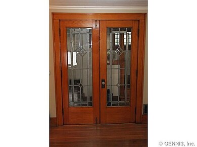 Other French Doors with leaded glass between Foyer