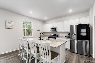 Kitchen featuring appliances with stainless steel